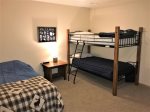 Lower level bedroom 4 with twin and twin/twin bunks